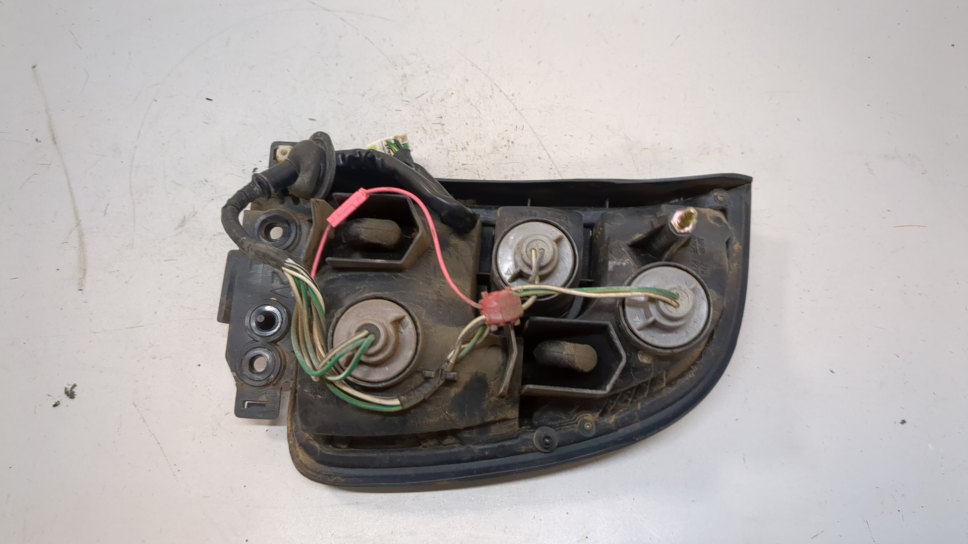 Фонарь задний левый