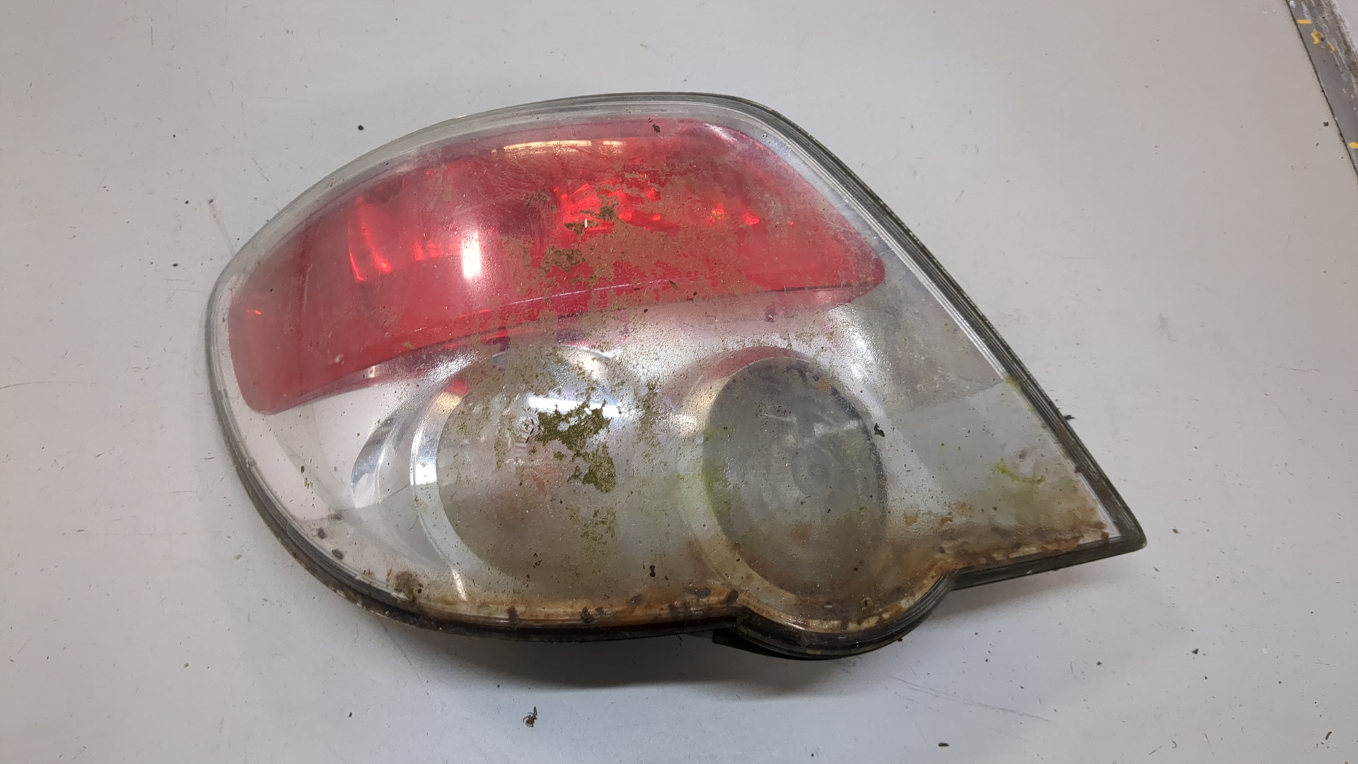 Фонарь задний левый