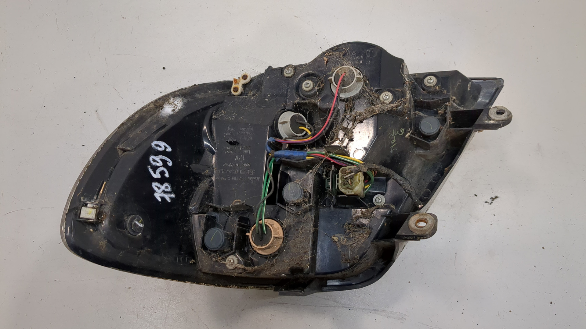 Фонарь задний левый