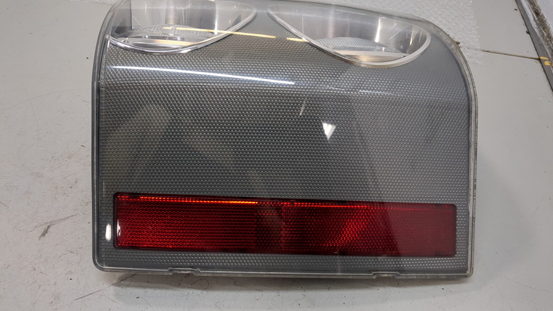 Фонарь задний левый