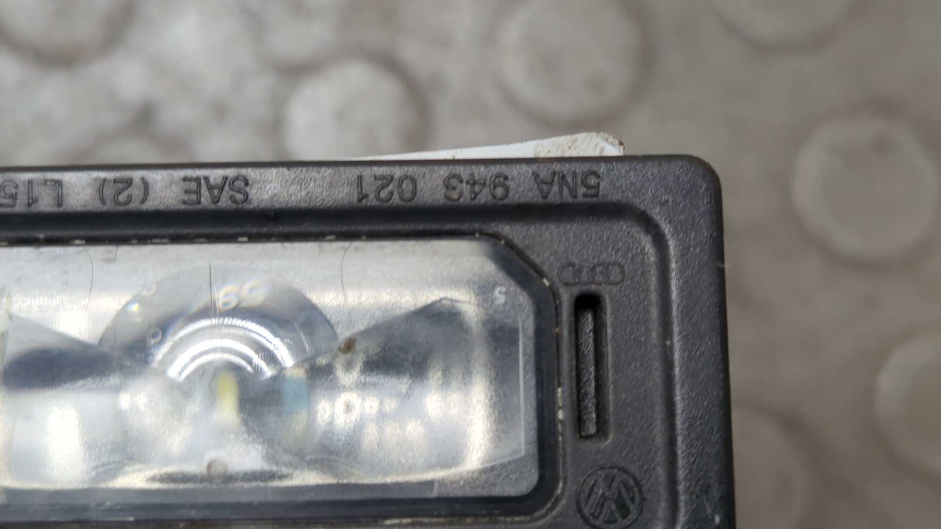 Фонарь подсветки номера