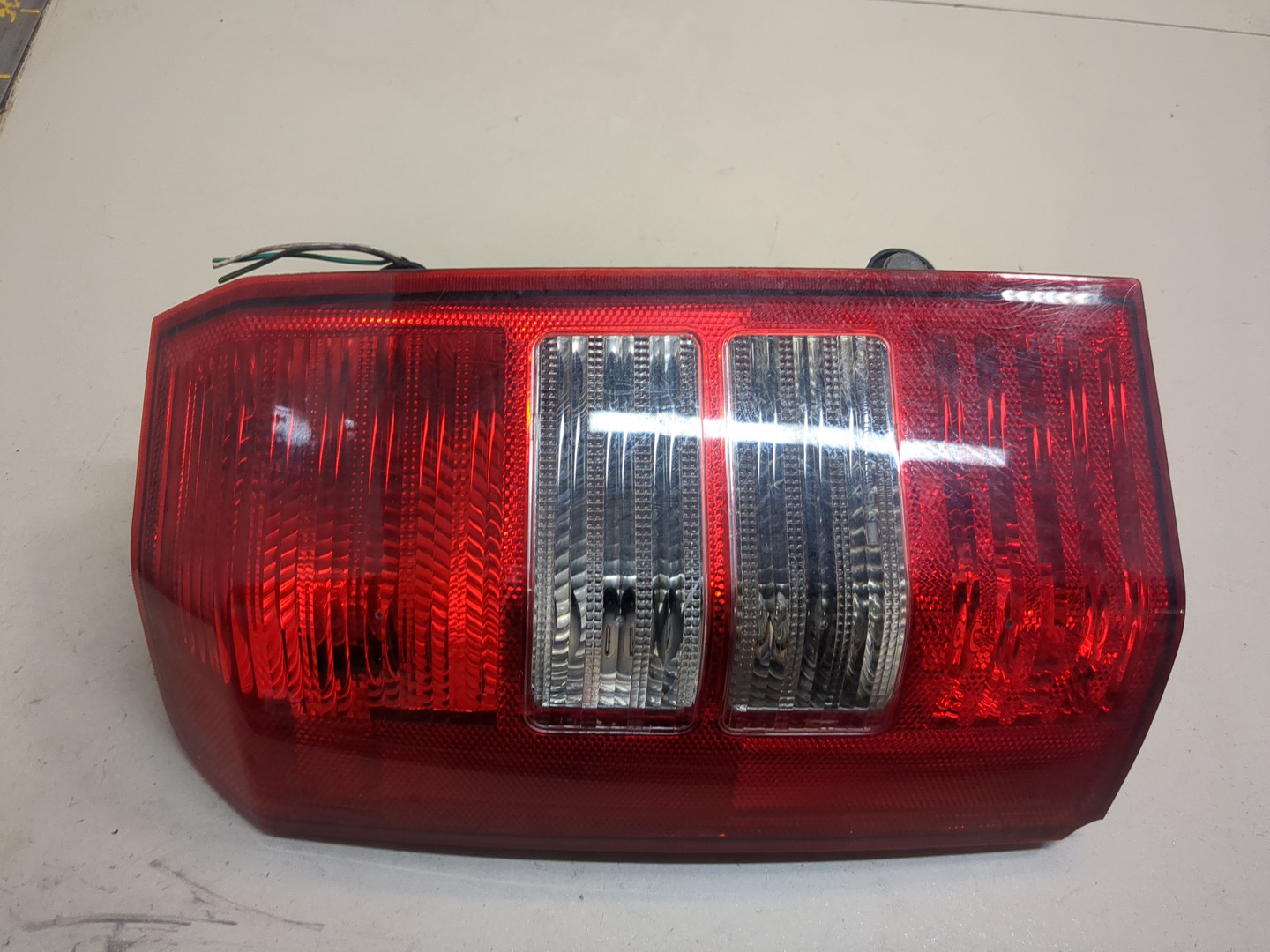 Фонарь задний левый