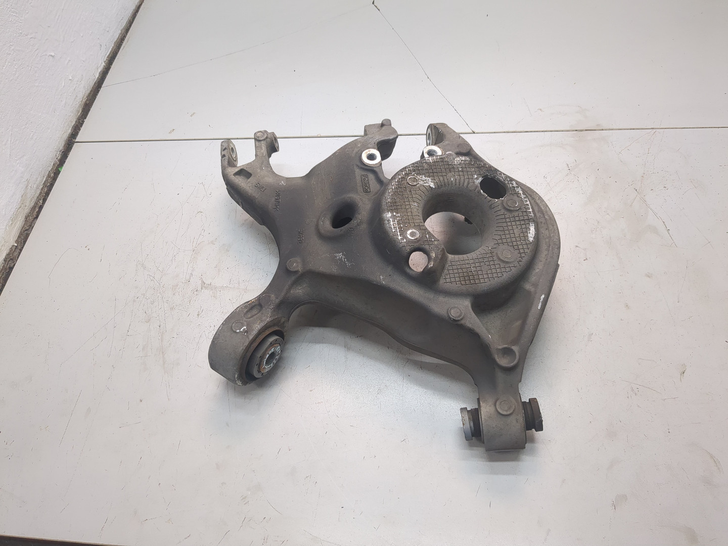 Рычаг задний левый