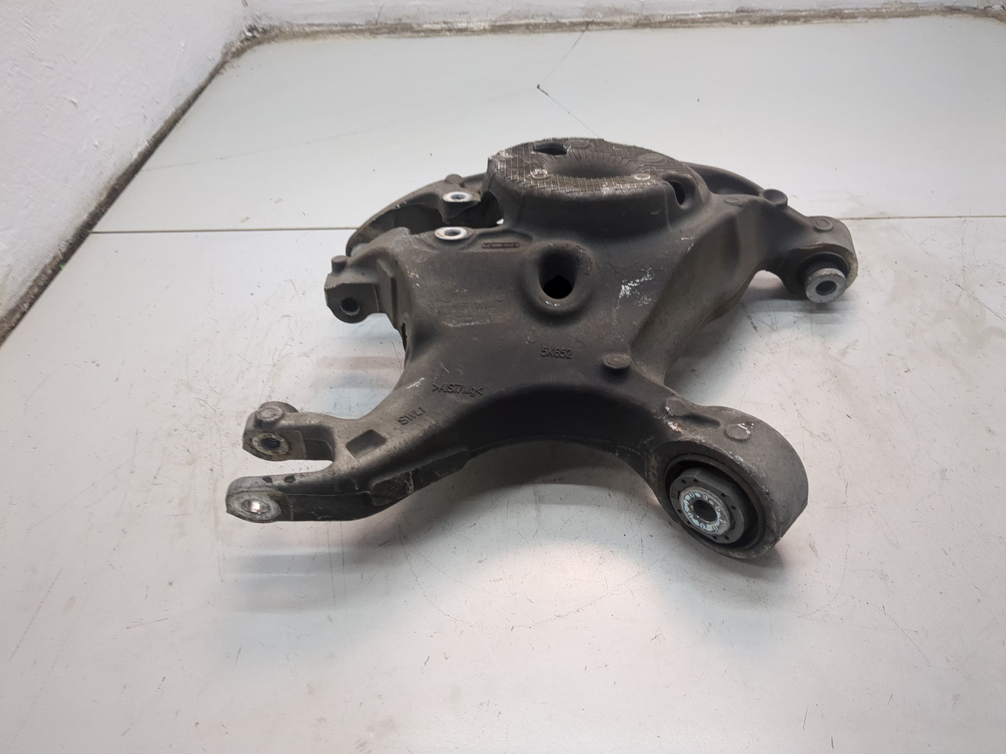 Рычаг задний левый