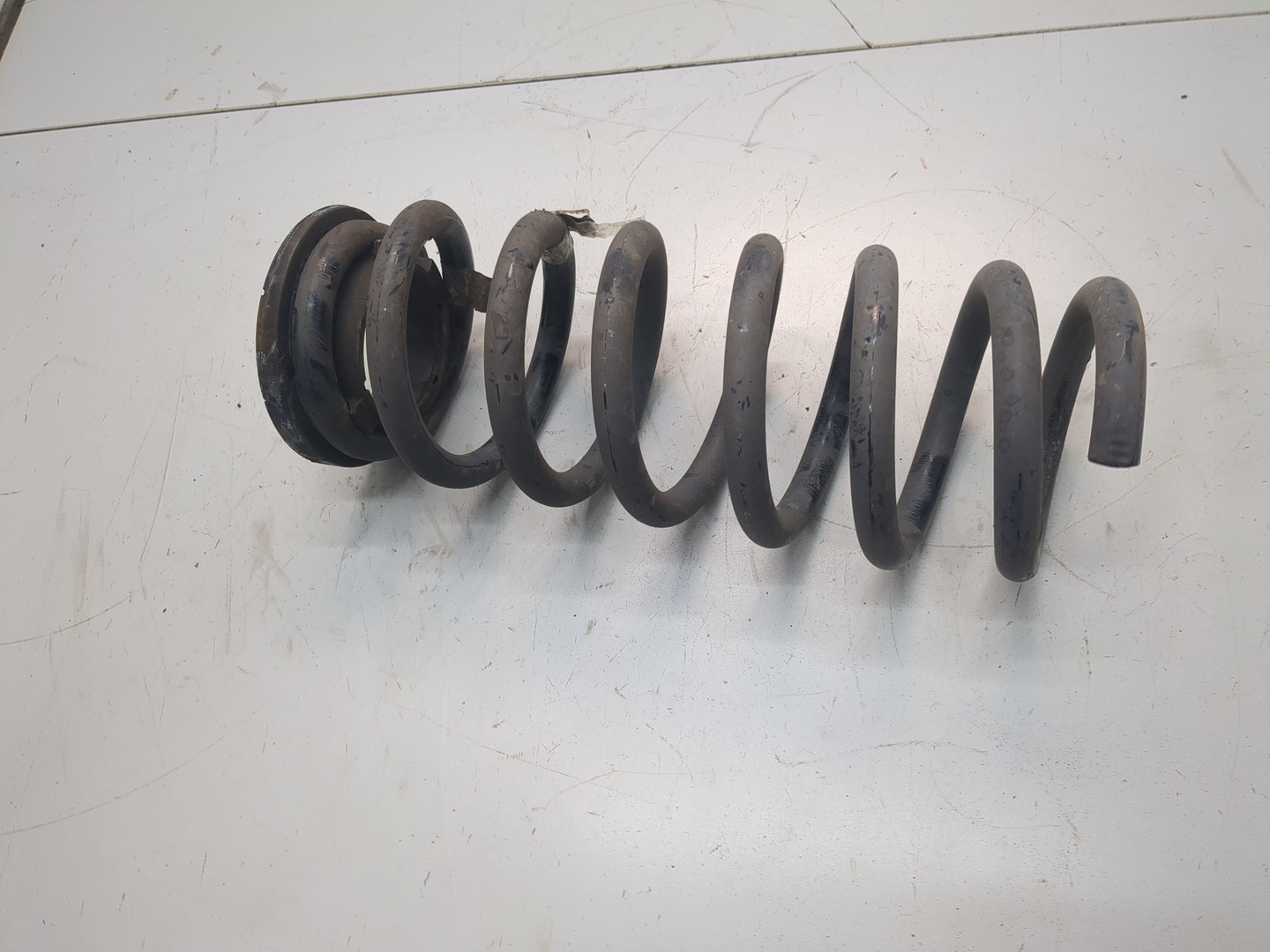 Пружина задняя