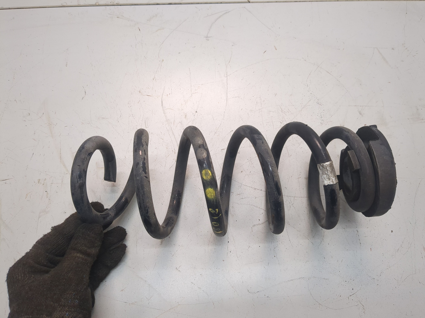 Пружина задняя