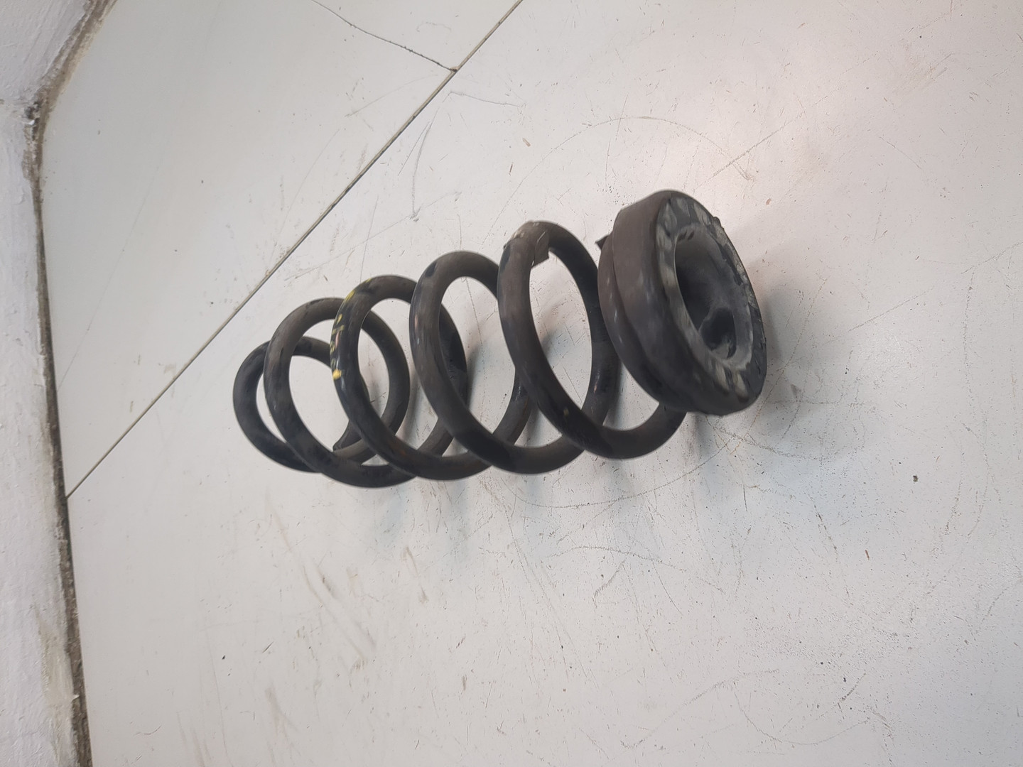 Пружина задняя