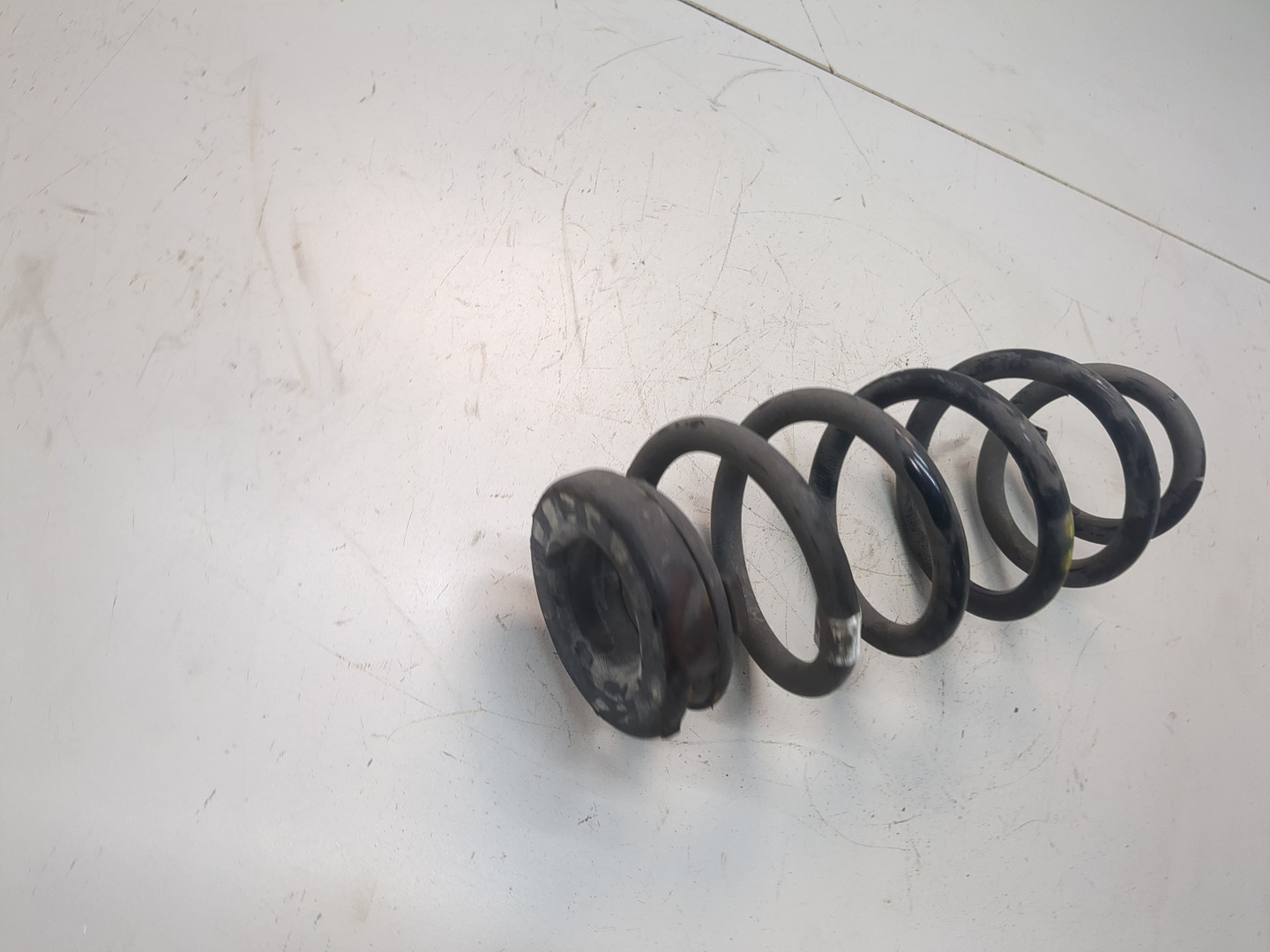 Пружина задняя