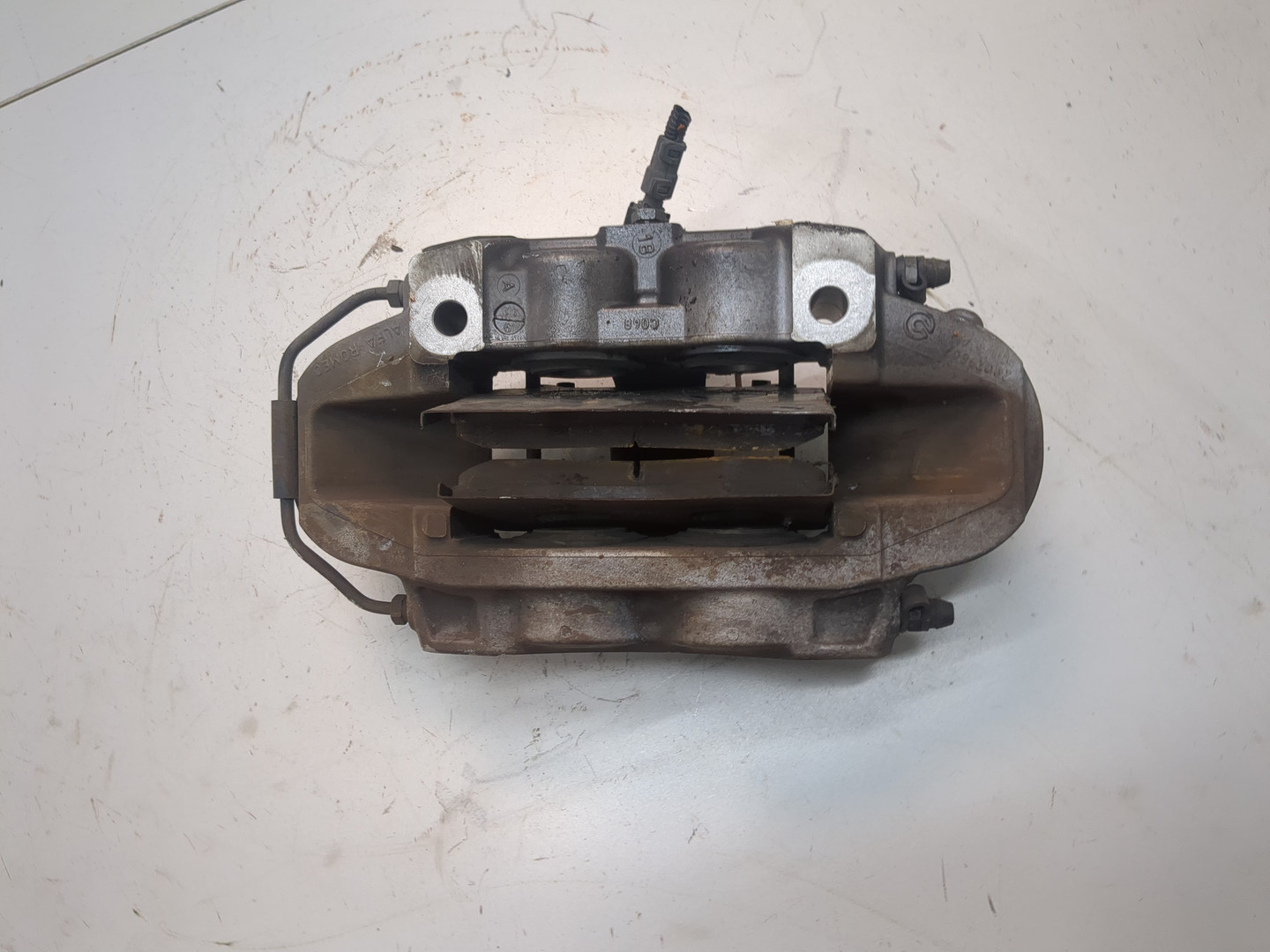 Суппорт передний левый