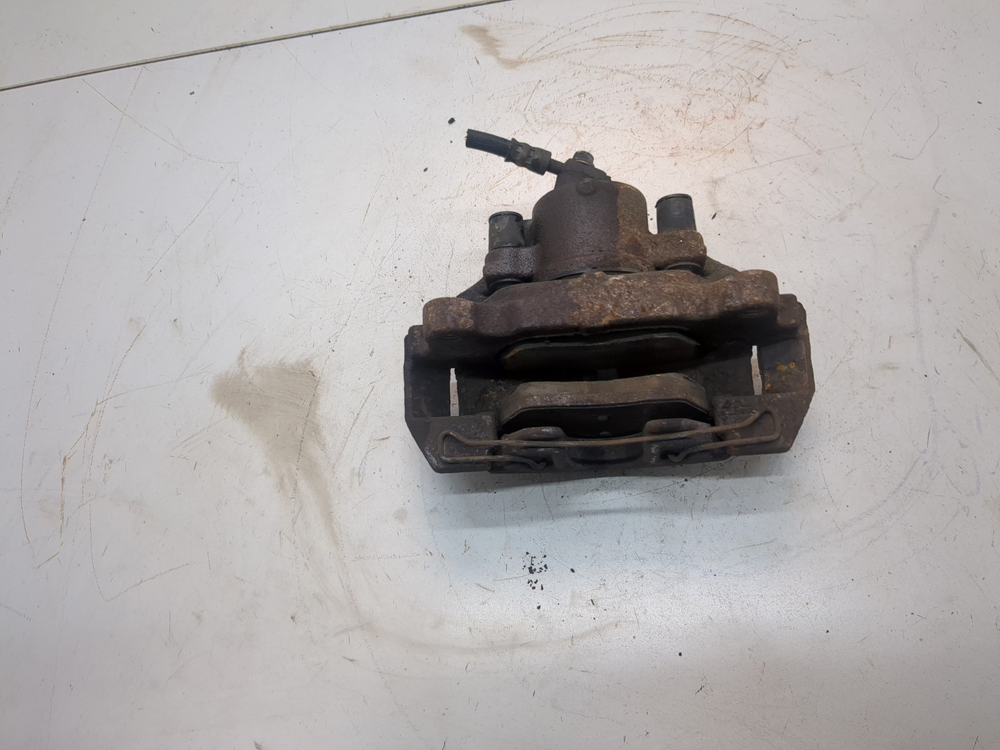 Суппорт передний левый