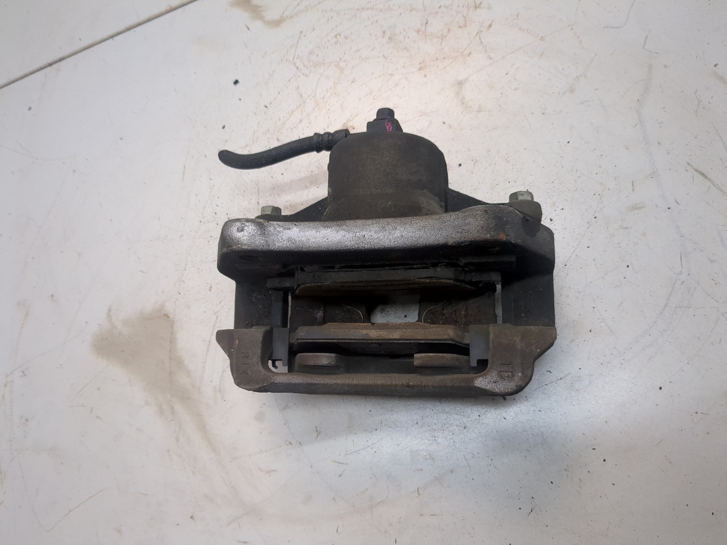 Суппорт передний левый