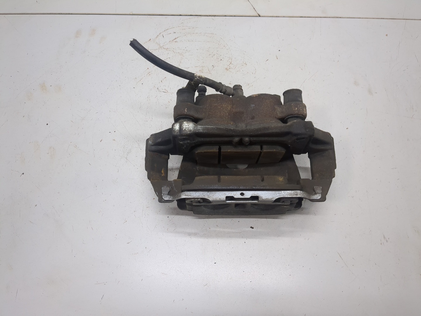 Суппорт передний левый