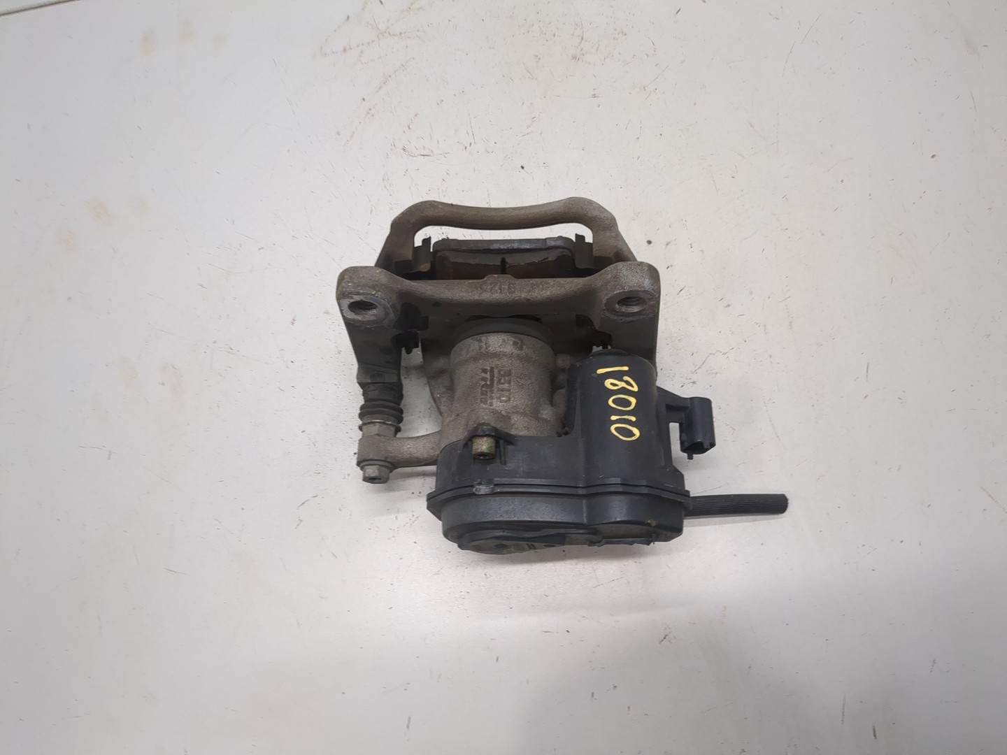 Суппорт задний левый