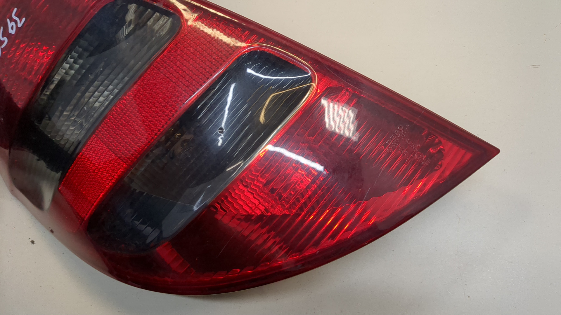 Фонарь задний левый