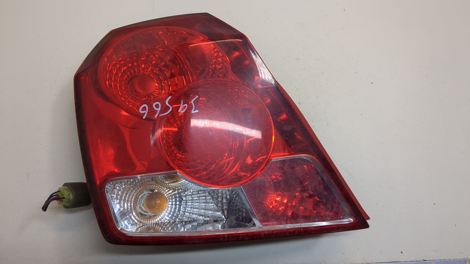 Фонарь задний левый