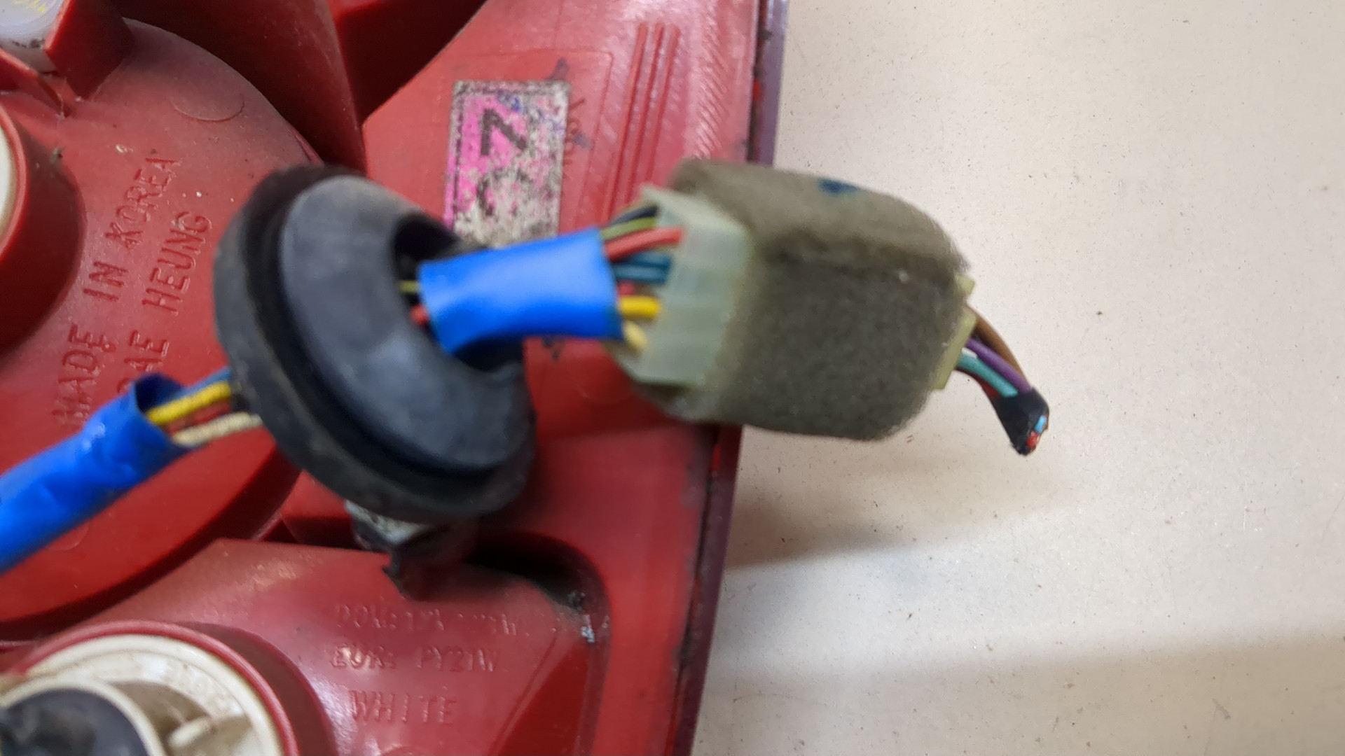 Фонарь задний левый