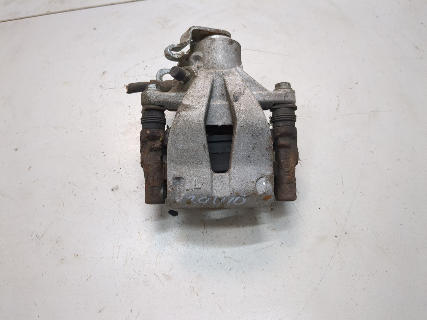 Суппорт задний левый