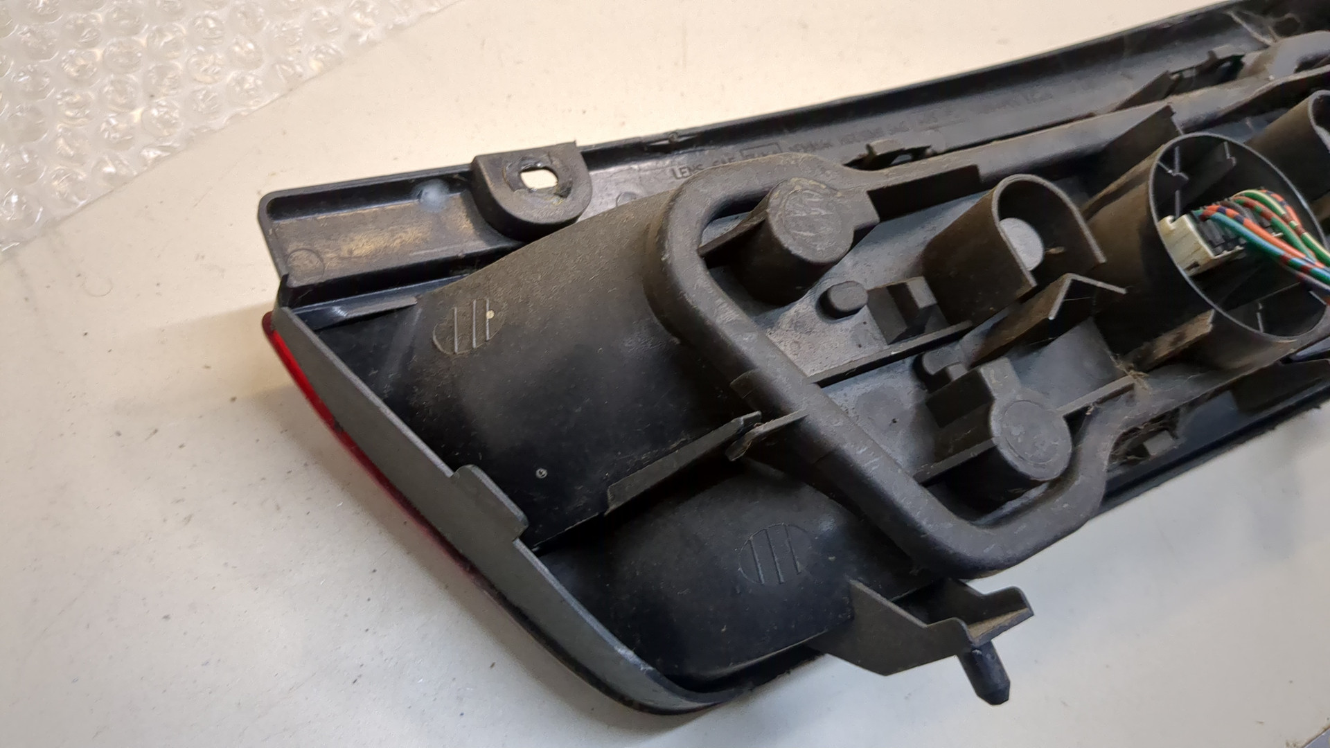 Фонарь задний левый