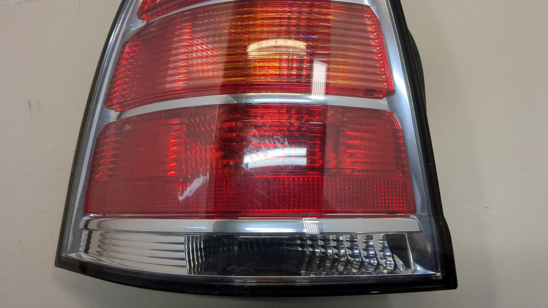 Фонарь задний левый