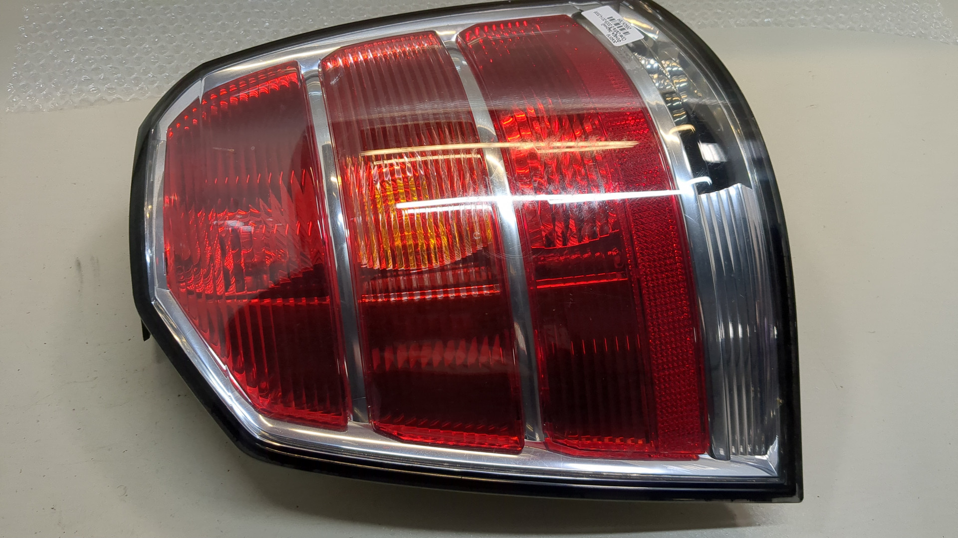 Фонарь задний левый