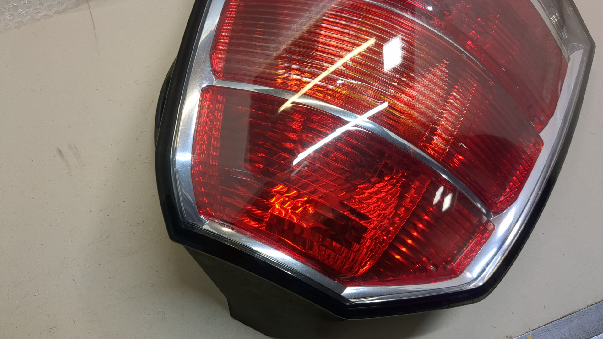 Фонарь задний левый