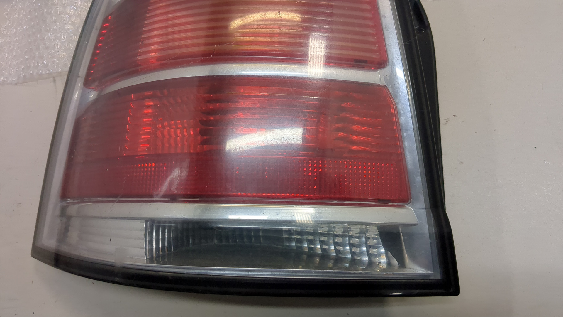 Фонарь задний левый