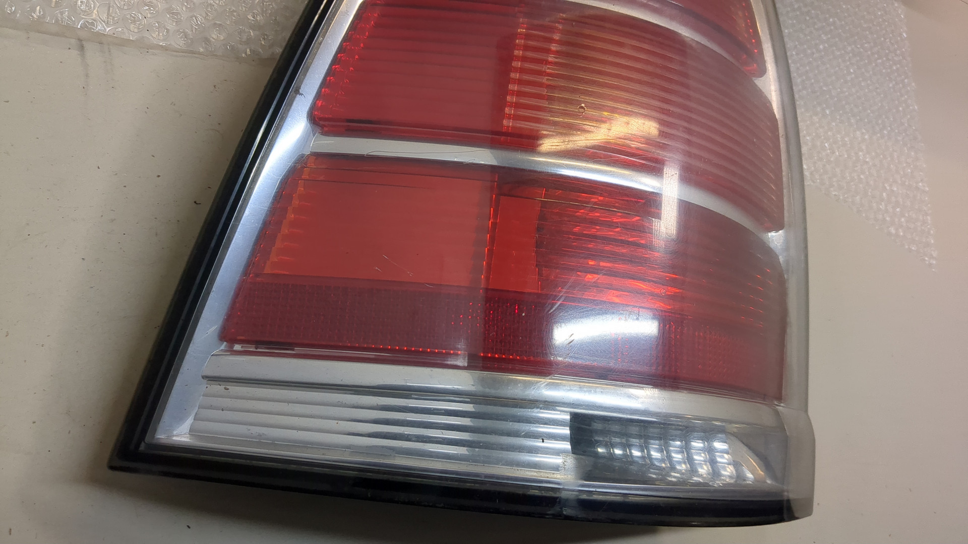 Фонарь задний левый