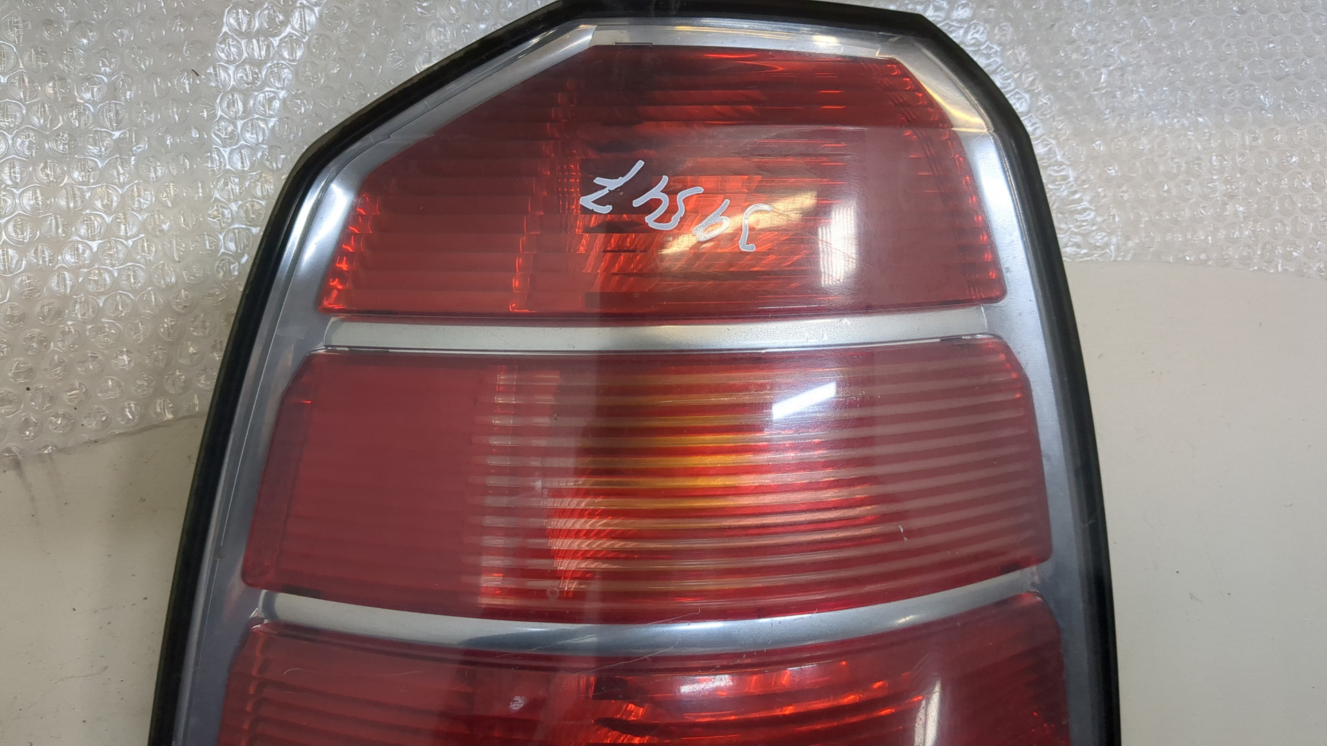 Фонарь задний левый