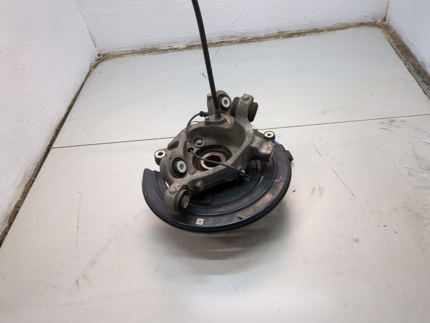 Кулак поворотный задний левый