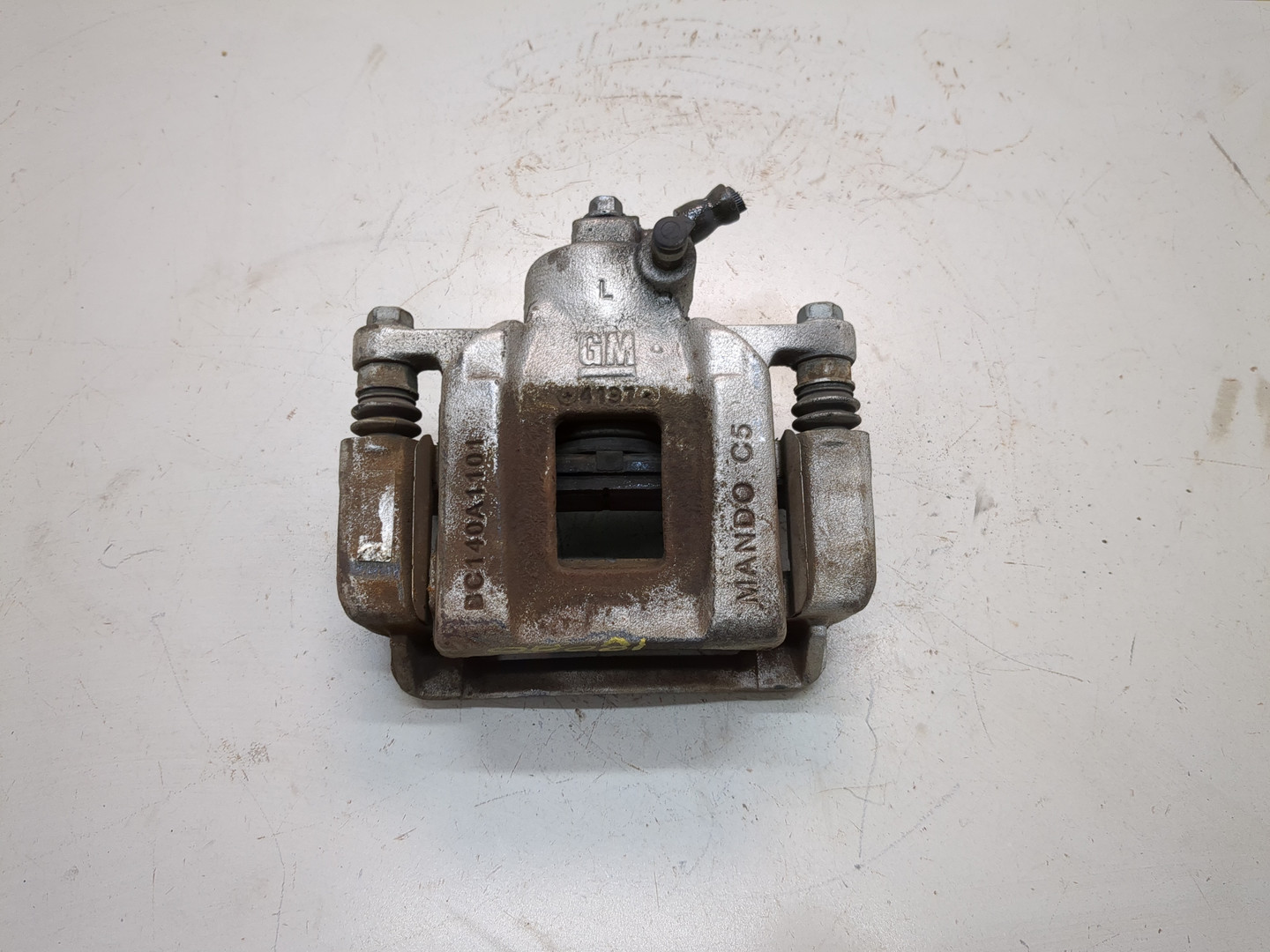 Суппорт задний левый