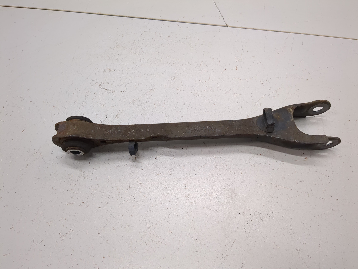 Рычаг задний