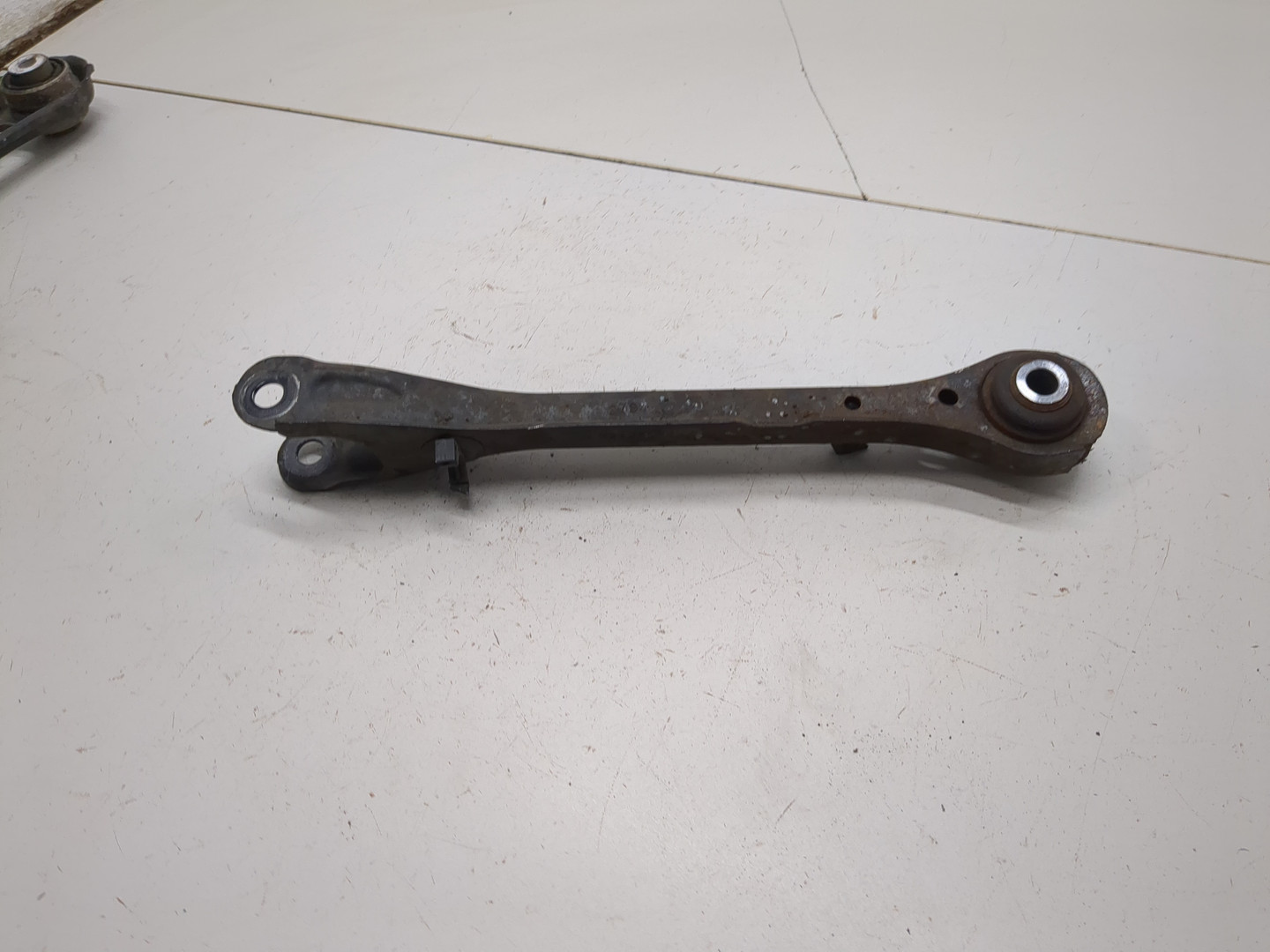 Рычаг задний