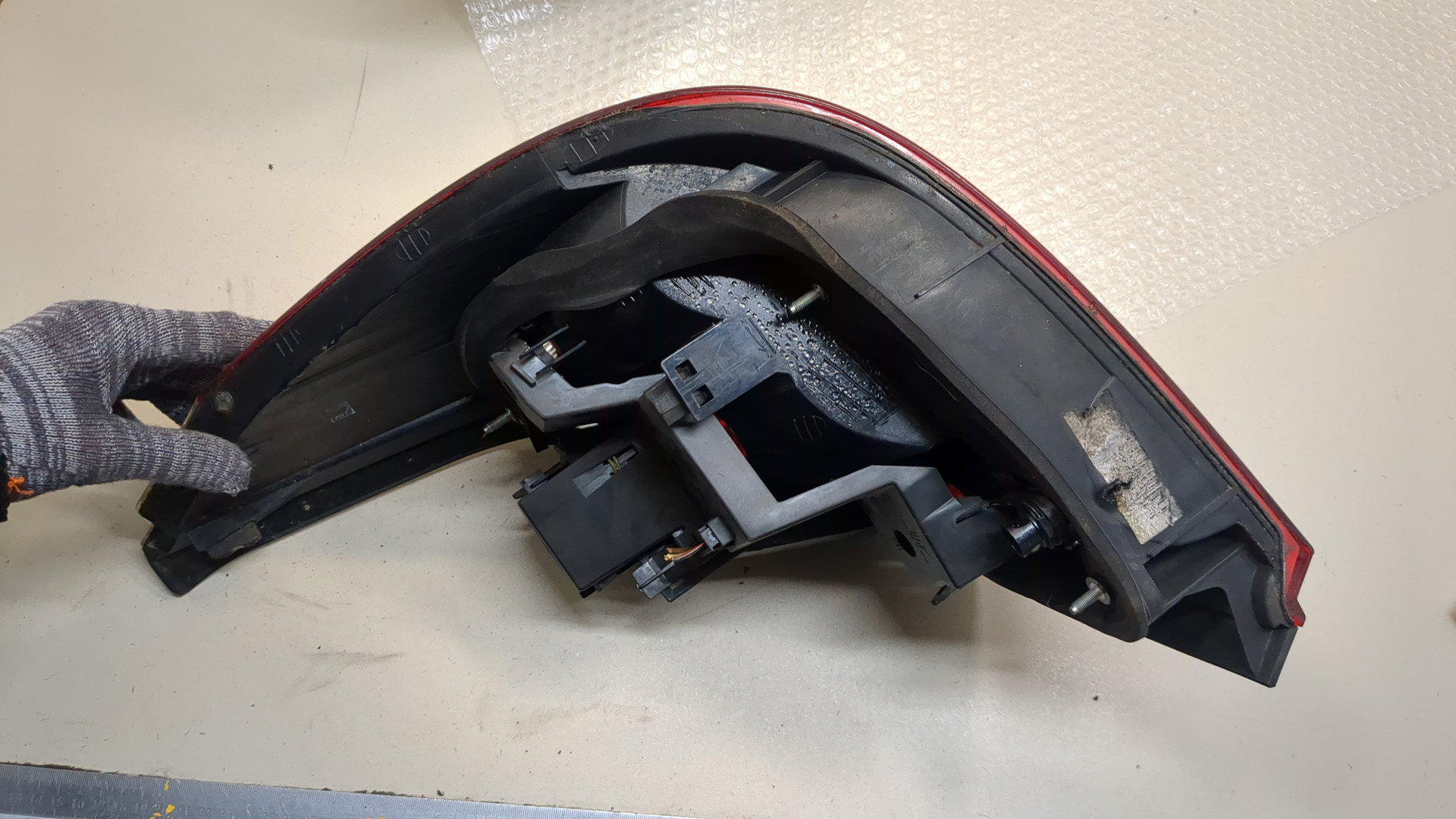 Фонарь задний левый