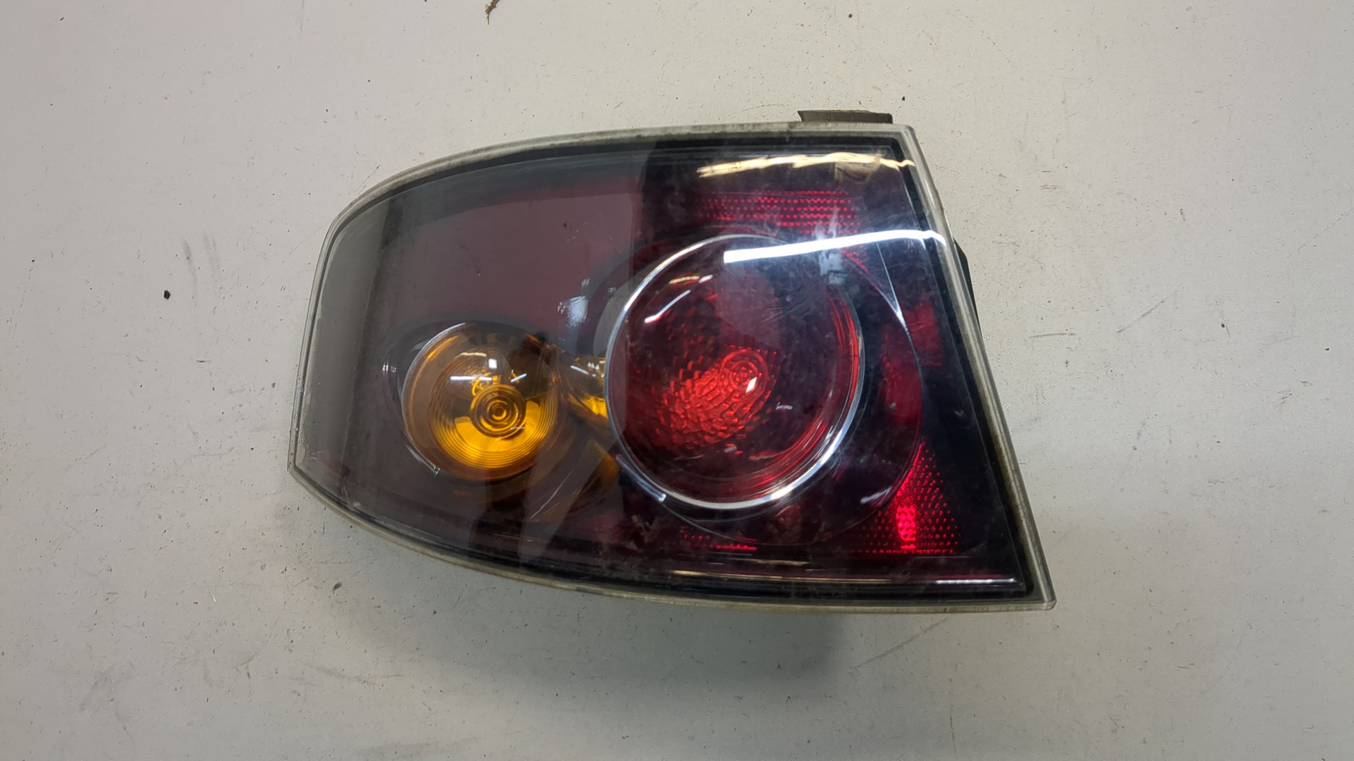 Фонарь задний левый