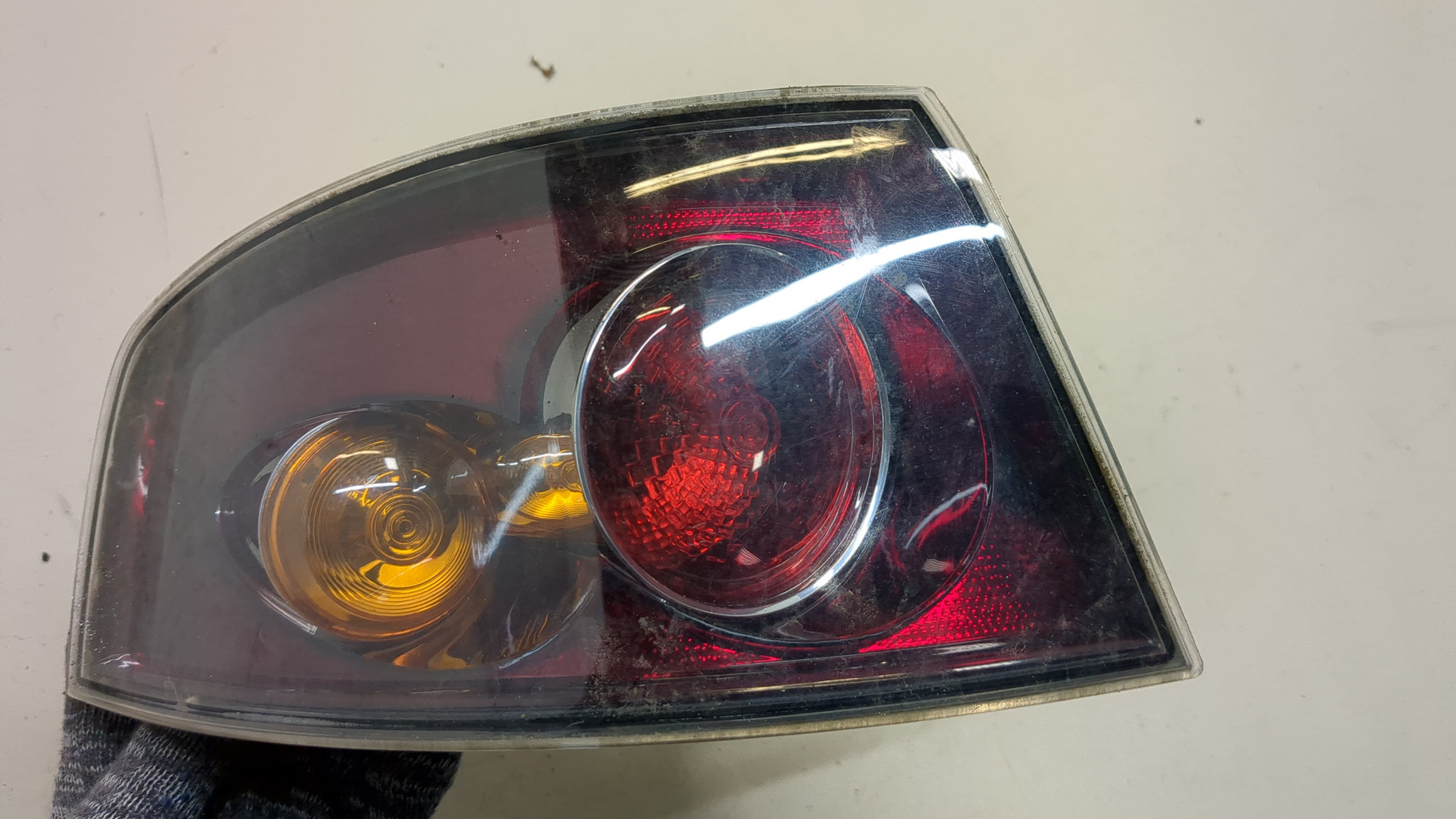 Фонарь задний левый