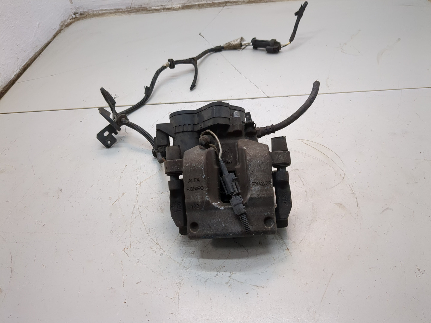 Суппорт задний левый