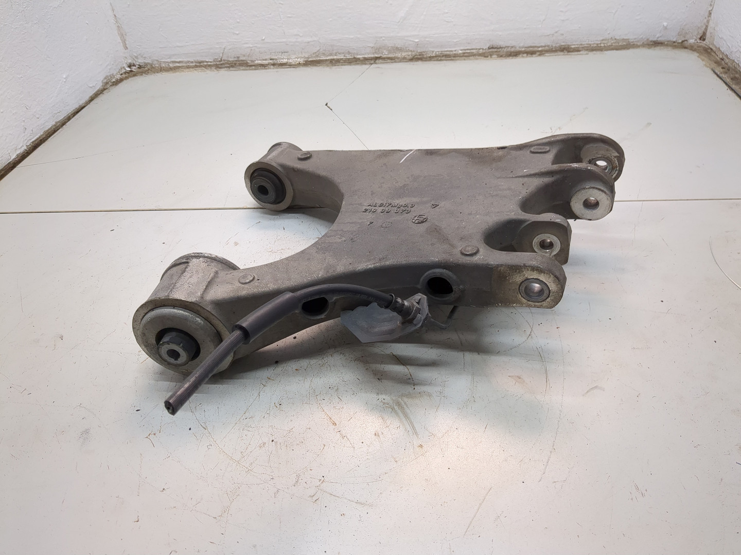 Рычаг задний правый