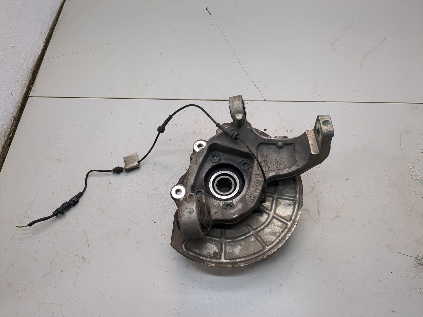 Кулак поворотный задний левый