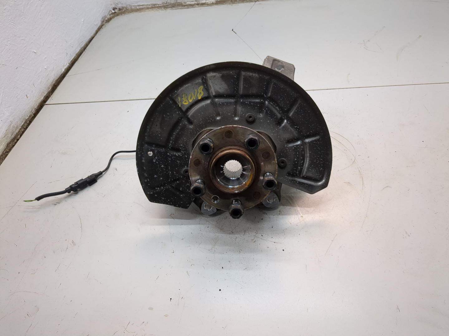 Кулак поворотный задний левый