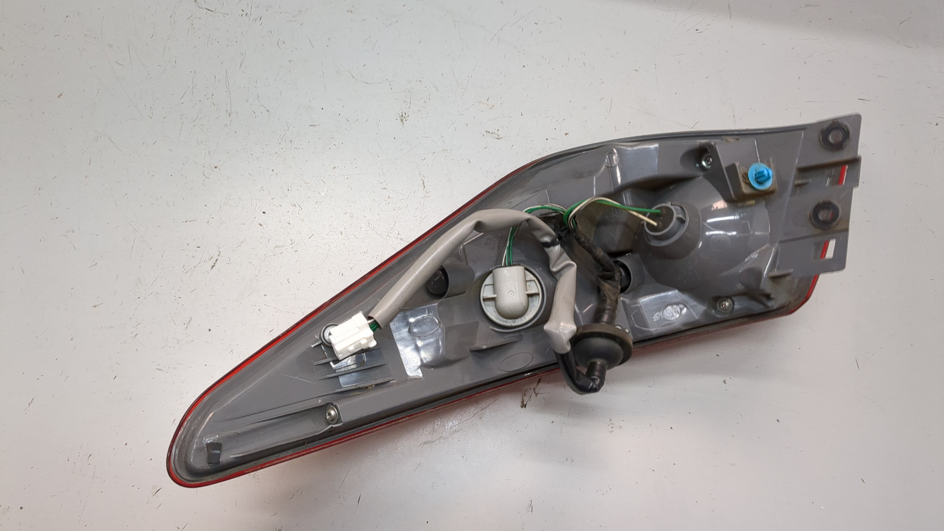 Фонарь задний левый