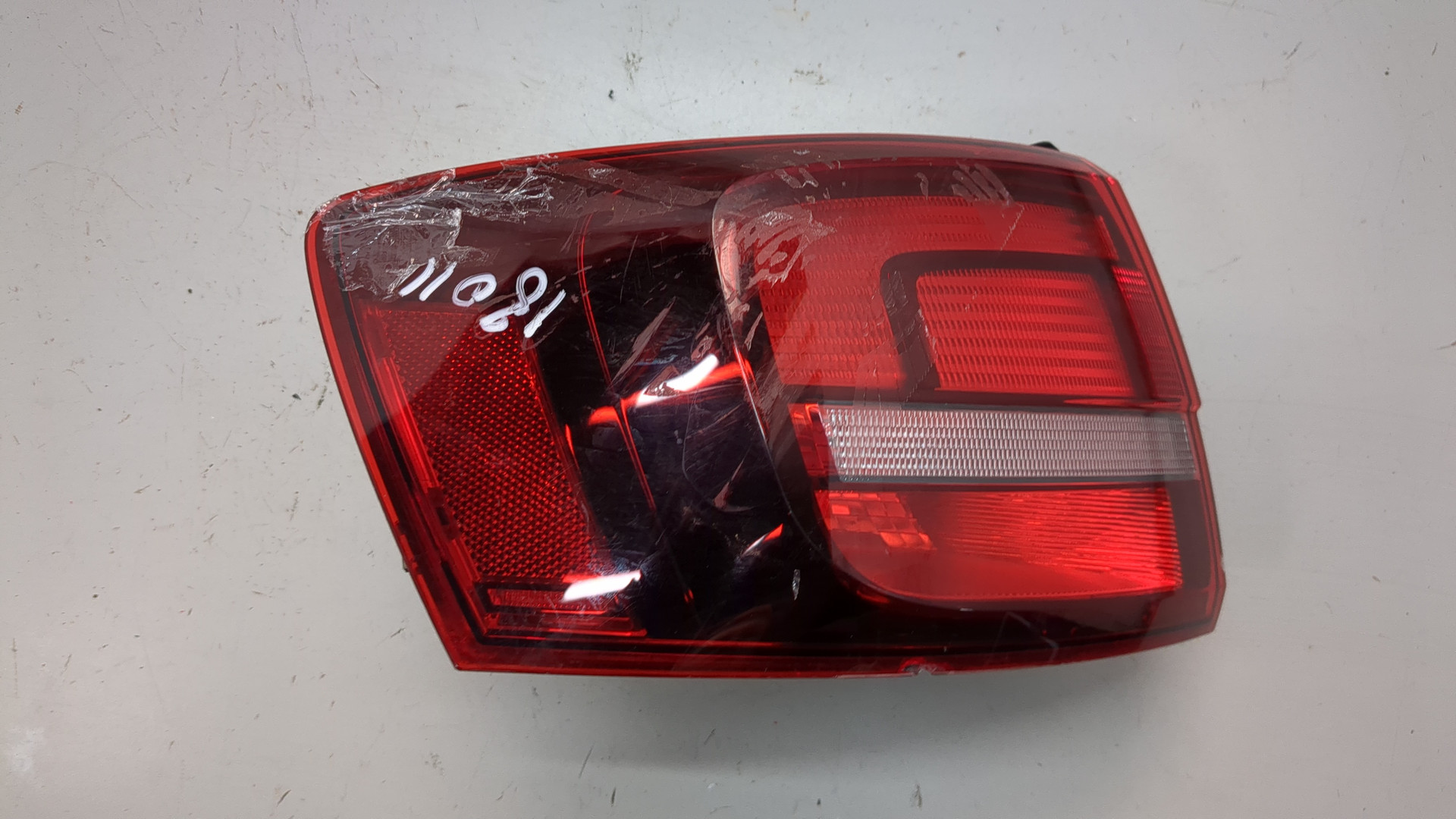 Фонарь задний левый