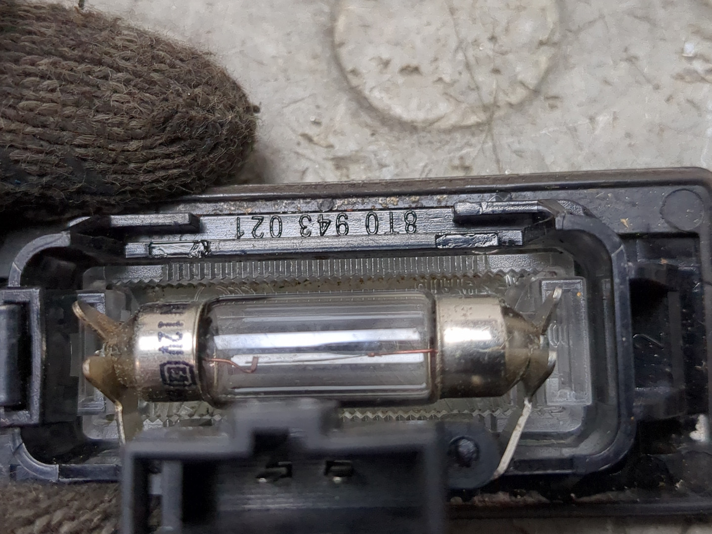 Фонарь подсветки номера