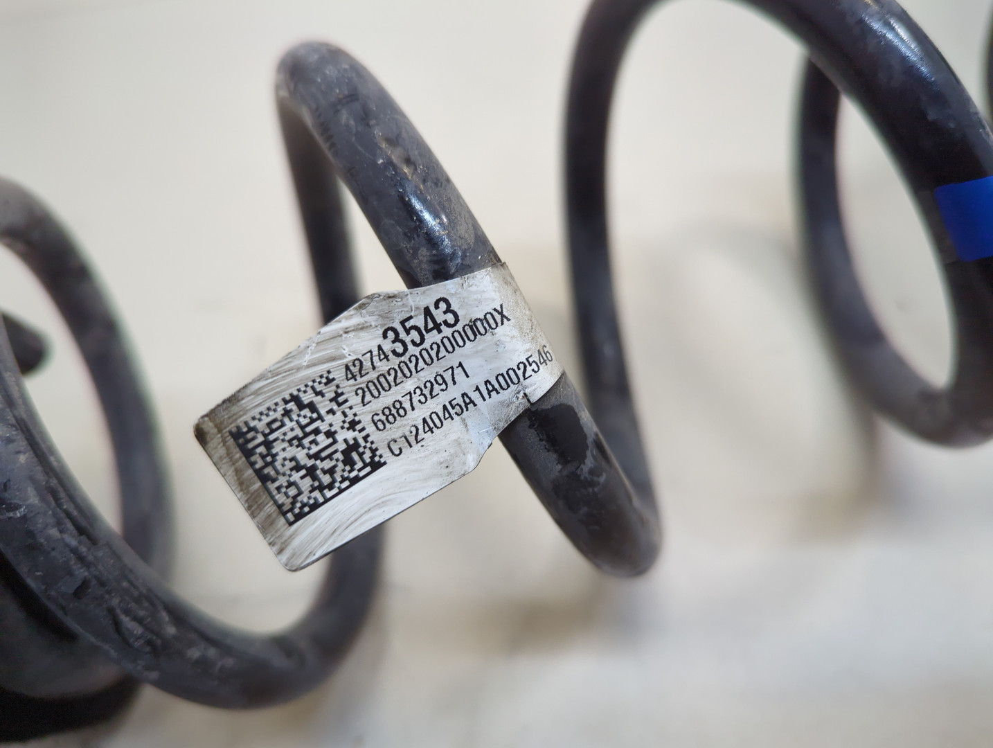 Пружина задняя