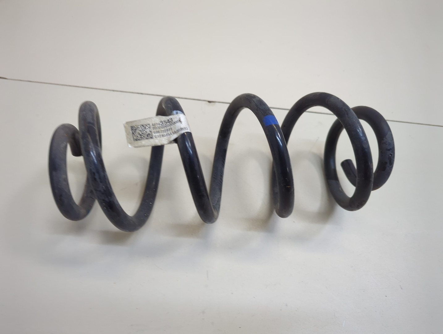 Пружина задняя