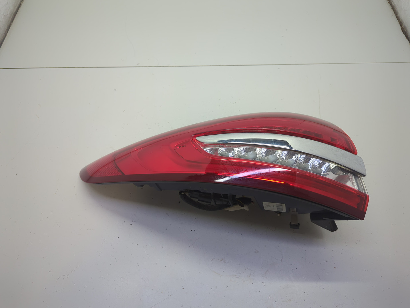 Фонарь задний левый