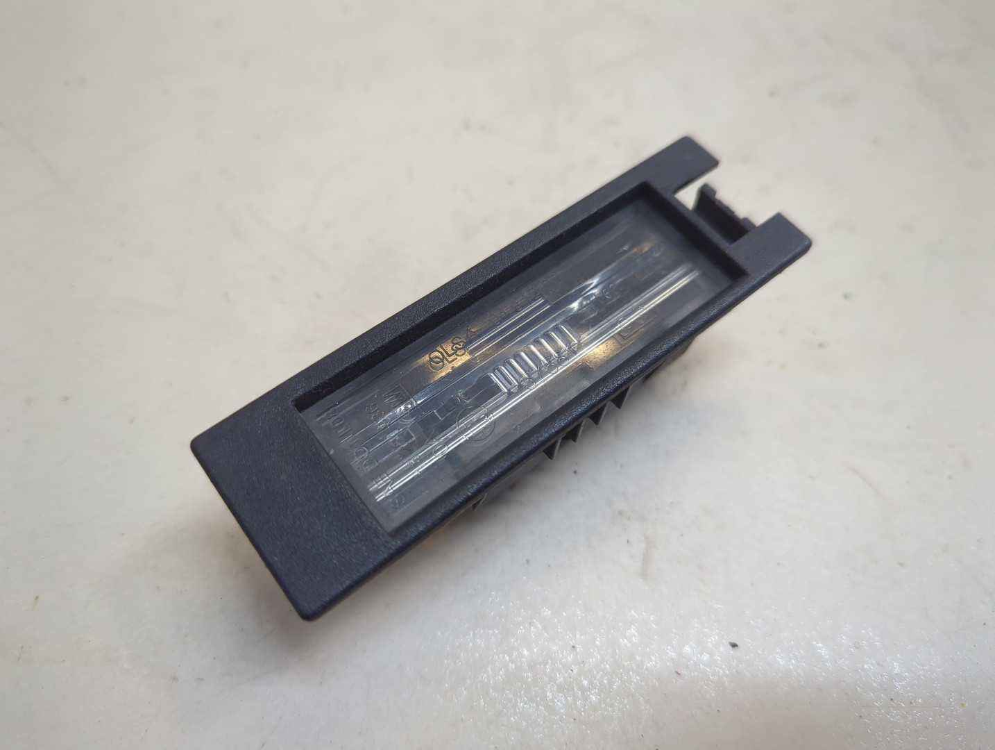 Фонарь подсветки номера