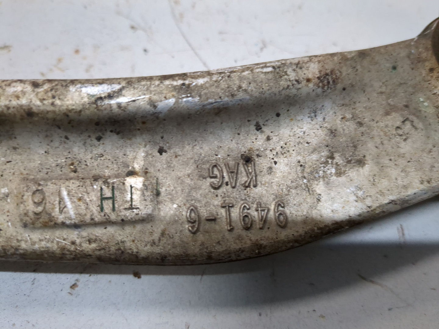 Рычаг задний левый