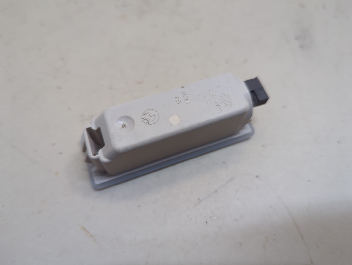 Фонарь подсветки номера