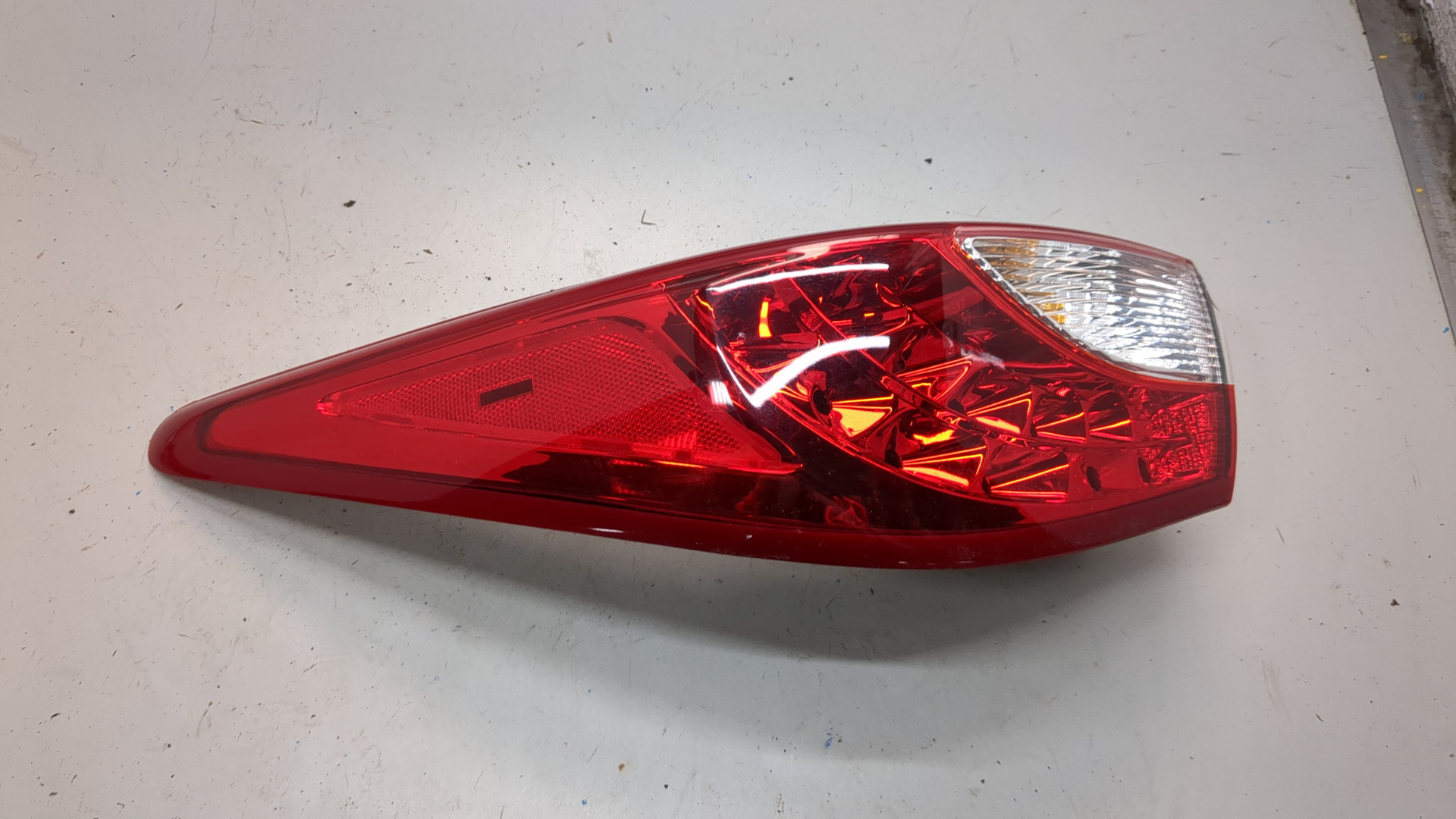 Фонарь задний левый