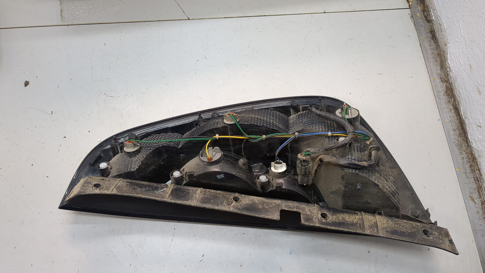 Фонарь задний левый